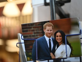 Royal memorabilia featuring Prince Harry, Duke of Sussex, and Meghan, Duchess of Sussex is displayed for sale in a store near Buckingham Palace in London on Jan. 10, 2020. (DANIEL LEAL-OLIVAS/AFP via Getty Images)