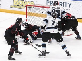 Winnipeg Ice Michael Teply scores on Moose Jaw Warriors goalie Brock Gould in the second period last night. James Carey Lauder photo