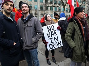 Demonstrators protest against war amid increased tensions between the United States and Iran, outside the United States consulate in Toronto, Ontario, Canada January 4, 2020.  REUTERS/Chris Helgren