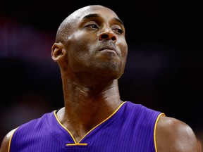 In this Dec. 2, 2015, file photo, Kobe Bryant of the Los Angeles Lakers looks on against the Washington Wizards in the first half at Verizon Center on in Washington, D.C.