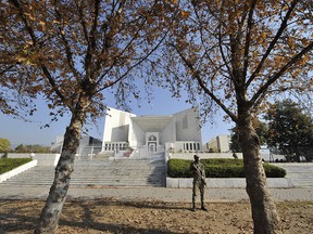 A Pakistani soldier keeps watch outside the Supreme Court building during a hearing of a secret memo scandal case in Islamabad on December 23, 2011. (AAMIR QURESHI/AFP/Getty Images)