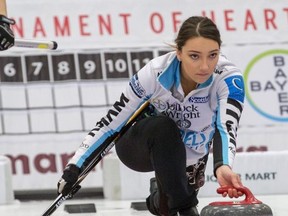 Kristy Watling delivers her shot at the Manitoba Scotties in Rivers, Man.,  yesterday. Connie Laliberte/Curl Manitoba