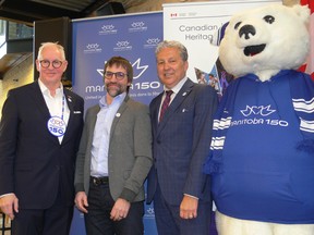 Manitoba 150 Host Committee co-chair Stuart Murray, Minister of Canadian Heritage Steven Guilbeault, Saint Boniface-Saint Vital MP Dan Vandal, and Manitoba 150 mascot Toba pose after the federal government announced on Tuesday at The Forks funding of $700,000 for the Manitoba 150 Host Committee's Unite 150 all-day concert at the Manitoba Legislative Building on June 27.
