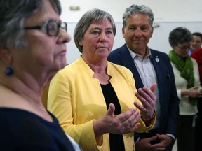 Deb Schulte (centre), federal minister of seniors, is flanked by Pat Elliott (left), Southdale Seniors board chair, and St. Boniface-St. Vital MP Dan Vandal, following an announcement of federal investment in Manitoba seniors at the Southdale Community Centre in Winnipeg on Tues., Jan. 21, 2020. Kevin King/Winnipeg Sun/Postmedia Network