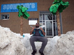 Sookram's Brewing owner Andrew Sookram soaks up some rays outside his Fort Rouge brewery and taproom in Winnipeg on Thurs., Jan. 23, 2020. Kevin King/Winnipeg Sun/Postmedia Network