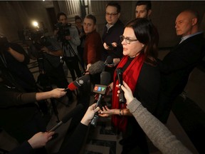 Families Minister Heather Stefanson speaks to the media at the Manitoba Legislature in Winnipeg on Friday.