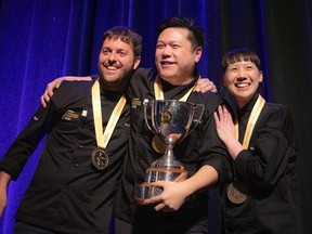 The Canadian Culinary Championships Grand Finale of Canada’s Great Kitchen Party events was held at the Shaw Centre Saturday, Feb. 1. Vancouver chef Roger Ma was the top winner Saturday night. From left: second place Marc-André Jetté of Hoogan et Beaufort in Montreal; first place winner Chef Roger Ma of the Boulevard Kitchen and Oyster Bar in Vancouver; and Chef Emily Butcher of deer + almond in Winnipeg.  Ashley Fraser/Postmedia