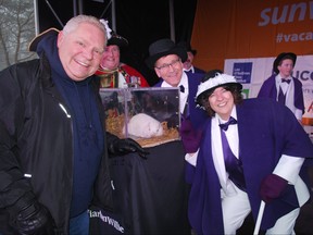 Groundhog gang From left, Ontario Premier Doug Ford, Bruce-Grey-Owen Sound MPP Bill Walker and South Bruce Peninsula Mayor Janice Jackson pose for pictures with Wiarton Willie during Groundhog Day festivities in Wiarton Sunday.