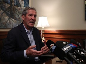 Premier Brian Pallister addresses the media following a court injunction by CN Rail that ended a blockade on their line near Headingly, Man., on Thursday, Feb. 13, 2020. Josh Aldrich/Winnipeg Sun/Postmedia