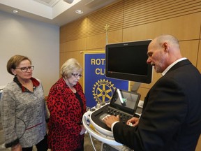 Interlake-Eastern Regional Heath Authority CEO Ron van Denakker (right) explains how a echocardiograph machine works to Rotary Club of Selkirk president Sharon Moolchan (far left) and vice-president Jean Oliver on Friday.