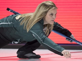 Team Wild Card skip Jennifer Jones calls her shot during draw 16 against team Canada at the Scotties Tournament of Hearts in Moose Jaw, Sask., Feb. 20, 2020. THE CANADIAN PRESS/Jonathan Hayward