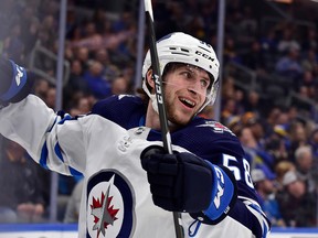 Winnipeg Jets winger Jansen Harkins celebrates after scoring his first NHL goal last night against the St. Louis Blues at the Enterprise Center.  Jeff Curry-USA TODAY Sports