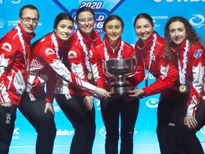 Mackenzie Zacharia's (far right) Altona, Man., rink -  third Karlee Burgess, second Emily Zacharias, lead/vice-skip Lauren Lenentine, alternate Rachel Erickson and coach Sheldon Zacharias – defeated South Korea’s Min-Ji Kim 7-5 in the championship final to claim the women’s title at the 2020 World Junior Curling Championships in Krasnoyarsk, Russia.