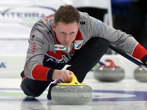 Skip Braden Calvert delivers a shot during the provincial men’s curling championship at Eric Coy Arena on Wednesday. Calvert cruised to an 11-1 win over Allan Gitzel. (KEVIN KING/WINNIPEG SUN)