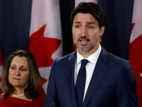 Canada's Prime Minister Justin Trudeau and Deputy Prime Minister Chrystia Freeland speak to news media in Ottawa, Ontario, Canada February 21, 2020.