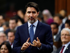 Canada's Prime Minister Justin Trudeau gestures as he speaks in parliament during Question Period in Ottawa, Ontario, Canada February 18, 2020.