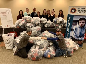 Canada Life employees made a special delivery to the Main Street Project on Monday – a mountain made of 4,000 pairs of socks.