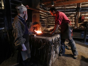 Costumed interpreters relive the daily life inside the blacksmith shop at Fort Gibraltar  during Festival du Voyageur in Winnipeg, Man., on Sunday, Feb. 16, 2020. The 51st annual Festival du Voyageur runs from Feb. 14 to 23, 2020.