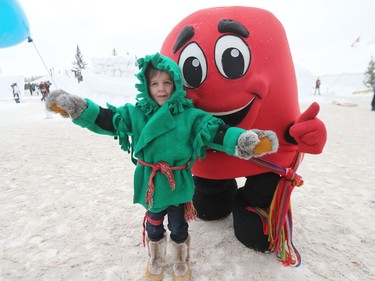 Four-year-old Beau has fun with Festival du Voyageur's mascot Léo La Tuque on Louis Riel Day at Festival du Voyageur in Winnipeg, Man., on Monday, Feb. 17, 2020. The 51st annual Festival du Voyageur in Winnipeg, Man., runs from Feb. 14 to 23, 2020.