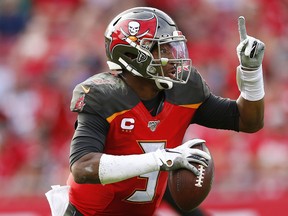 Jameis Winston of the Tampa Bay Buccaneers scrambles with the ball against the Atlanta Falcons during the second half at Raymond James Stadium on Dec. 29, 2019 in Tampa, Fla. (Michael Reaves/Getty Images)