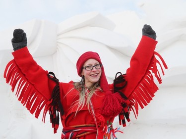 Ile des Chênes resident Cedelynne Lachance, 24, shows off the capote she made by hand while she attends Festival du Voyageur in Winnipeg, Man., on Sunday, Feb. 16, 2020. The 51st annual Festival du Voyageur in Winnipeg, Man., runs from Feb. 14 to 23, 2020.
