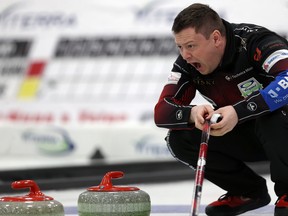 Skip Jason Gunnlaugson calls on the sweepers during the provincial men’s curling championship at Eric Coy Arena in Winnipeg earlier this week. Team Gunnlaugson defeated Mike McEwen by an 8-6 score to book their spot in Sunday’s final, where they could face McEwen again. (KEVIN KING/WINNIPEG SUN)