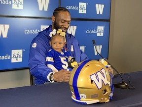 Jefferson addresses the media with his daughter Kelley yesterday. Paul Friesen/Winnipeg Sun