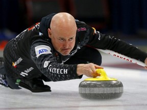 Skip Kevin Koe releases a rock during the ATB Glencoe Invitational Bonspiel at the Glencoe Club in Calgary, on Feb. 13, 2020.