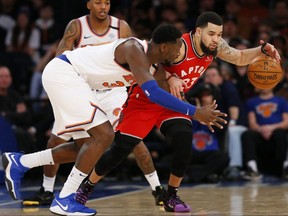 Raptors guard Fred VanVleet (right) dribbles the balll against Knicks forward Julius Randle (left) during second half NBA action at Madison Square Garden in New York City, on. Jan. 24, 2020.