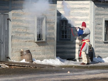 La Compagnie de La Vérendrye participate in a reenactment of the Red River Skirmish against the Forces of Lord Selkirk inside Fort Gilbraltar on the final day of the 51st annual Festival du Voyageur in Winnipeg, Man., on Sunday, Feb. 23, 2020.