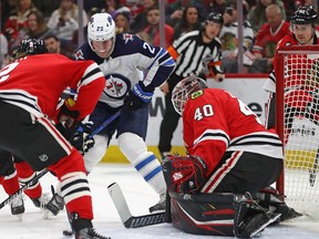 Patrik Laine and the Winnipeg Jets play host to the Chicago Blackhawks on Sunday. (Jonathan Daniel/Getty Images)