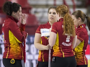 Team Nunavut skip Lori Eddy, left, speaks to her teammates during Draw 9 against Team Northern Ontario at the Scotties Tournament of Hearts in Moose Jaw, Sask., Tuesday, Feb. 18, 2020.