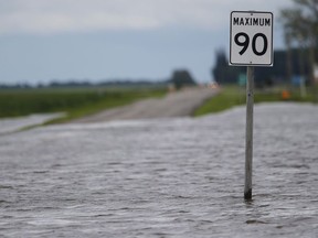 Security and Westjet staff closed the road to Brandon's airport due to overland flooding in Brandon and surrounding southwest Manitoba on June 30, 2014. Heavy precipitation in the United States is adding to concerns about potential flooding this spring in Manitoba.