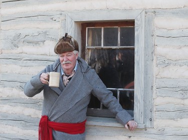 Murray Gillespie, who is a clerk at the trading post inside Fort Gilbraltar, takes a break while volunteering on the final day of the 51st annual Festival du Voyageur in Winnipeg, Man., on Sunday, Feb. 23, 2020.