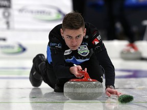 Skip Ryan Wiebe releases his rock during the provincial men’s curling championship at Eric Coy Arena in Winnipeg on Thursday. Wiebe is defeated J.T. Ryan to move to 2-0 at the event, where he’ll next face Jason Gunnlaugson. (KEVIN KING/WINNIPEG SUN)