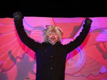 Steinbach resident Mark Lanouette shows his enthusiasm on the opening day of Festival du Voyageur while standing in front of a snow sculpture. The 51st annual Festival du Voyageur in Winnipeg, Man., runs from Feb. 14 to 23, 2020.