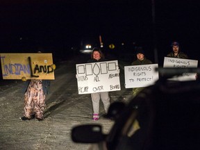 First Nations members of the Tyendinaga Mohawk Territory block train tracks servicing Via Rail, as part of a protest against British Columbia's Coastal GasLink pipeline, in Tyendinaga, Ont., on Sunday, Feb. 9, 2020.