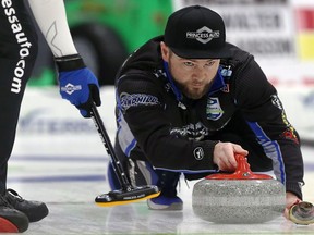 Skip Mike McEwen delivers during the provincial men's curling championship at Eric Coy Arena in Winnipeg on Thurs., Feb. 6, 2020. Kevin King/Winnipeg Sun/Postmedia Network