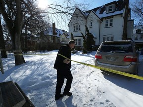 A Winnipeg police forensics service unit member returns into a home in the first 100 block of Middle Gate in the Armstrong's Point area of Winnipeg on Wed., Feb. 12, 2020. Police were called to the home early Tuesday morning for the report of a stabbing. Jordan James Bonwick has been charged with second-degree murder in the stabbing death of Michael Bruyere, police say. Kevin King/Winnipeg Sun/Postmedia Network