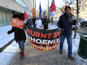 Supporters march on Broadway near Smith Street during a rally hosted by the Public Service Alliance of Canada in Winnipeg on Wed., Feb. 19, 2020 attempting to force the federal government's hand in compensating members affected by the Phoenix Pay System. Kevin King/Winnipeg Sun/Postmedia Network