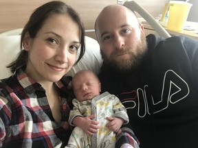 The first Leap Year Baby ever born at the new HSC Winnipeg Women’s Hospital arrived on Saturday at 1:29 a.m. Mother Jenna Kennedy and father Nick MacKinnon pose with baby Milo MacKinnon who weighed in at five pounds, seven ounces (2.47 kilograms).