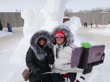 Ziggy Pankiewicz and his wife Agnus take a selfie while checking out the sculptures at the Festival du Voyageur in Winnipeg, Man., on Sunday, Feb. 16, 2020. The 51st annual Festival du Voyageur in runs from Feb. 14 to 23, 2020.