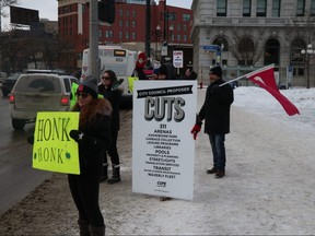 CUPE 500 protests out front of Winnipeg City Hall on Tuesday about potential cuts to city services in the upcoming budget to be released by the city on Friday.