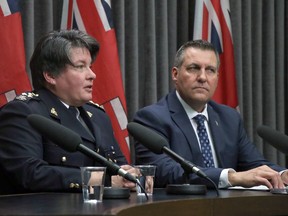 RCMP commanding officer Assistant Commissioner Jane MacLatchy and Justice Minister Cliff Cullen address the media during an announcement of $180,000 in funding to support a coordinated province-wide campaign to identify and stop methamphetamine dealers and traffickers at the Manitoba Legislature in Winnipeg on Monday.