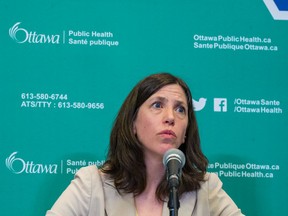 Citizen photographer Errol McGihon shoots Dr. Vera Etches, Medical Officer of Health, Ottawa Public Health, during a press conference in early March. Media updates are now happening via teleconferencing and other social distancing tools.