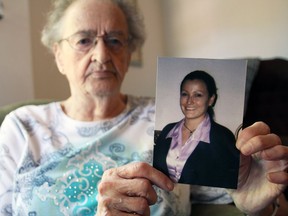 Eleanor Hands with a photo of her daughter Nicolle Hands at her home in Kingston, Ont., on Tuesday, August 20, 2019. Nicolle was murdered while living in Winnipeg in 2003 with her three children.