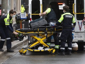 As Torontonians adjust to life during the Covid-19 pandemic; paramedics respond to calls on March 29, 2020. (Stan Behal, Toronto Sun)