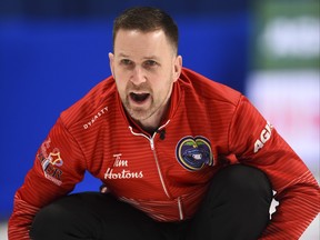 Team Newfoundland skip Brad Gushue takes on Team Nunavut at the Brier in Kingston, Ont., on Tuesday, March 3, 2020. THE CANADIAN PRESS/Sean Kilpatrick