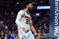 Denver Nuggets guard Jamal Murray reacts following a basket against the Milwaukee Bucks earlier this season. (USA TODAY SPORTS)