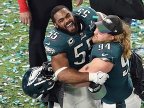 Brandon Graham, left, and Beau Allen, rigth, of the Philadelphia Eagles celebrate winning Super Bowl LII against the New England Patriots at U.S. Bank Stadium on Feb. 4, 2018 in Minneapolis, Minn. (Christian Petersen/Getty Images)